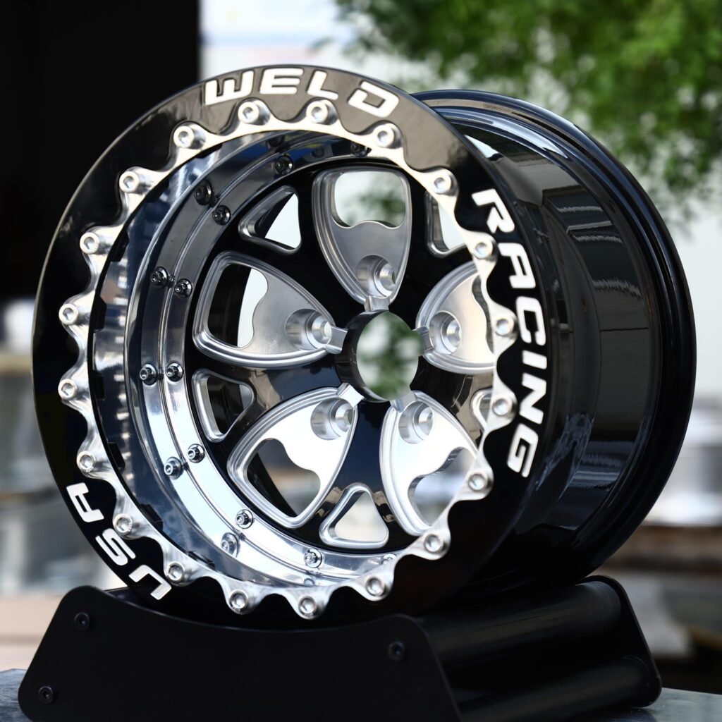 Chevrolet Camaro wheels – Black Machined Beadlock Wavy-Ring 5-Spoke (Weld Racing-Style), angled view