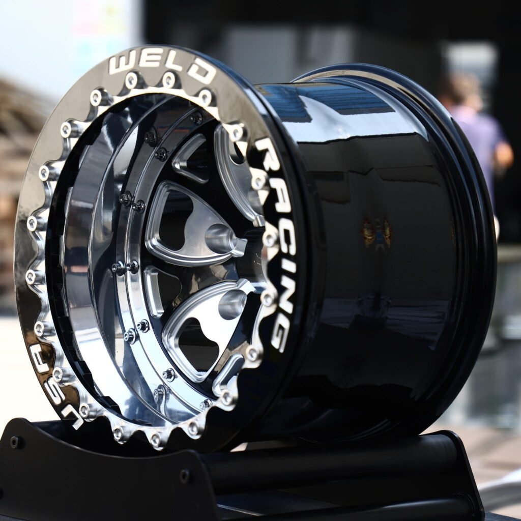 5x114.3 wheels – Black Machined Beadlock Wavy-Ring 5-Spoke (Weld Racing-Style), side view