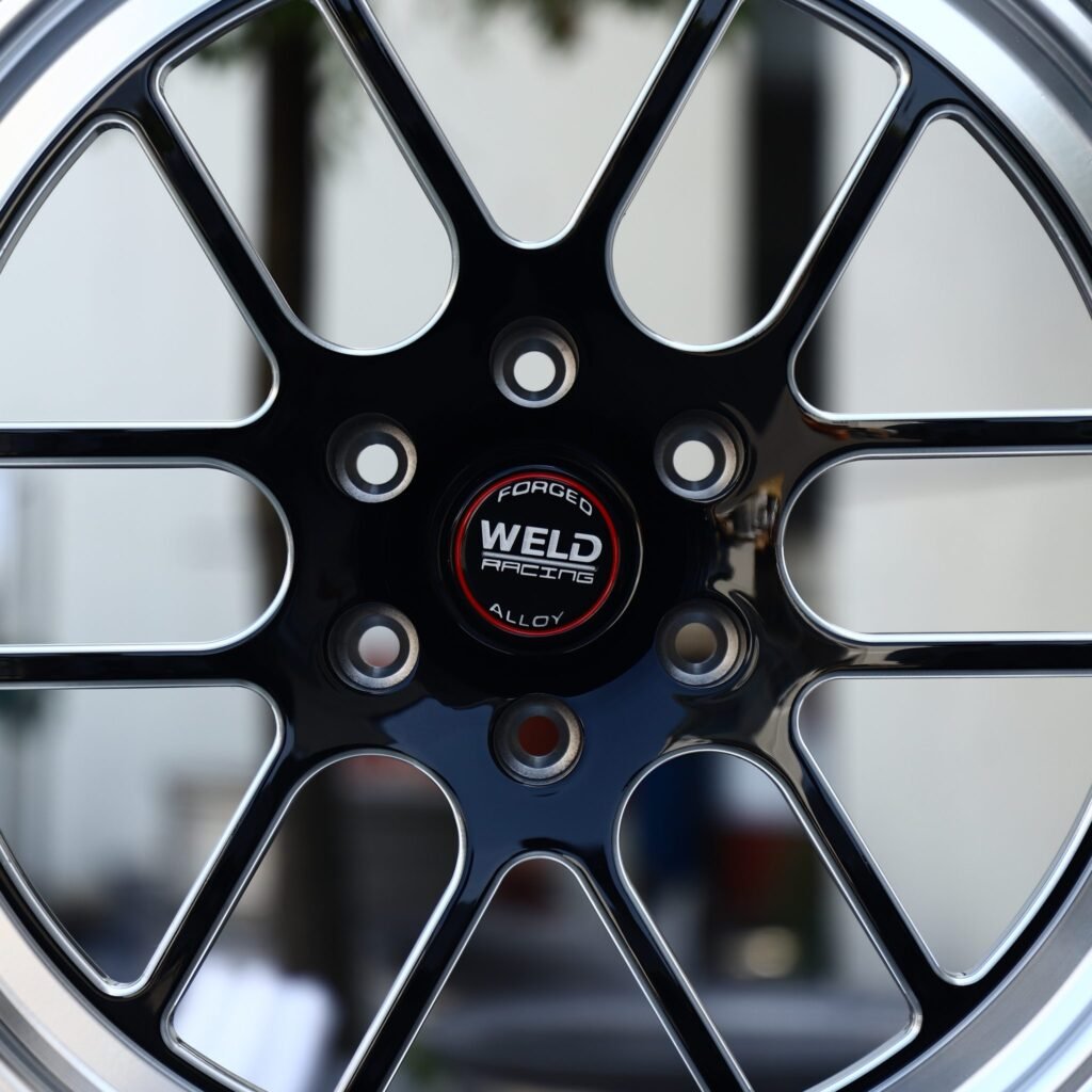 Toyota Tacoma wheels – Black / Milled 12-Window Polished Deep Lip (Weld Racing-Style), lip and barrel detail