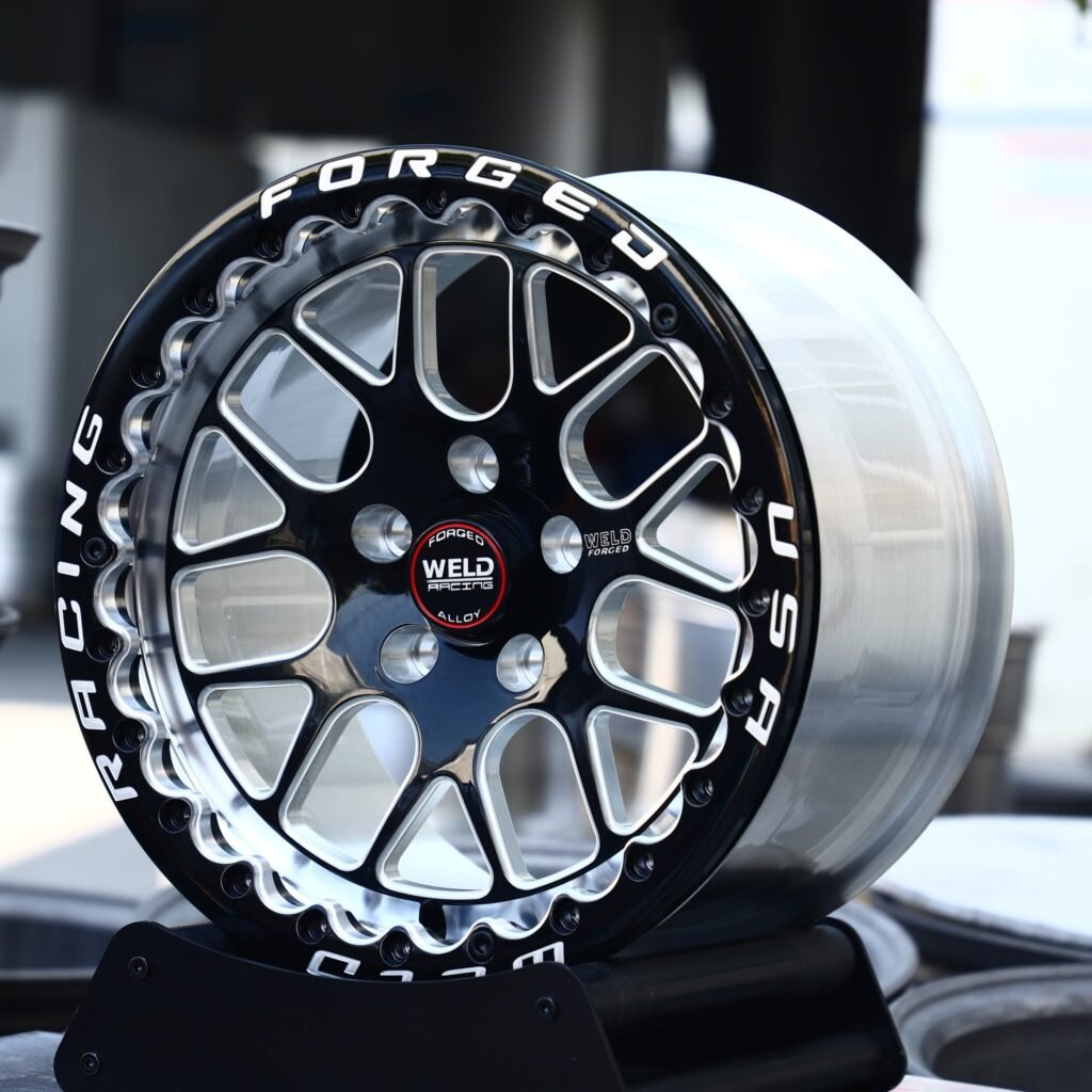 Ford Mustang wheels – Black / Milled Mesh Beadlock (Weld Racing-Style), angled view