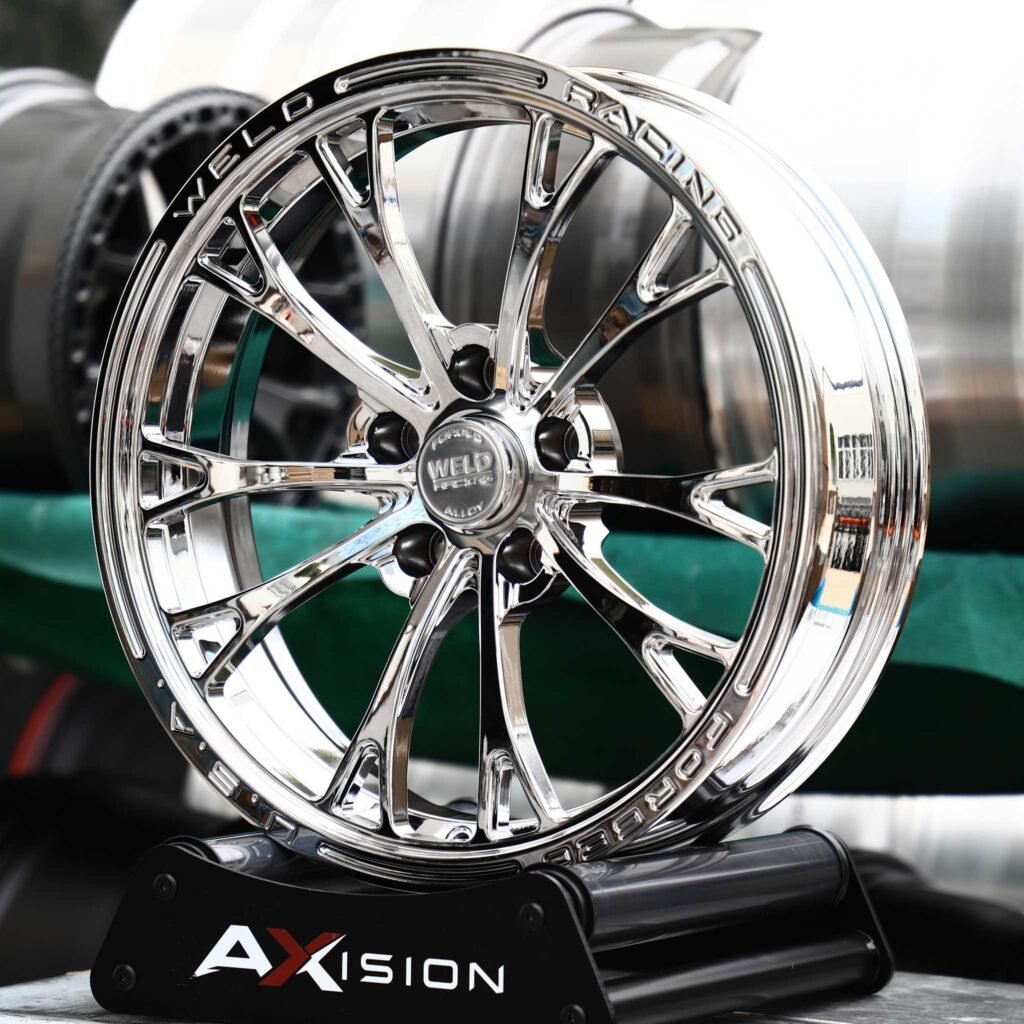 Dodge Challenger wheels – Chrome 10-Spoke Lettered Lip (Weld Racing-Style), angled view