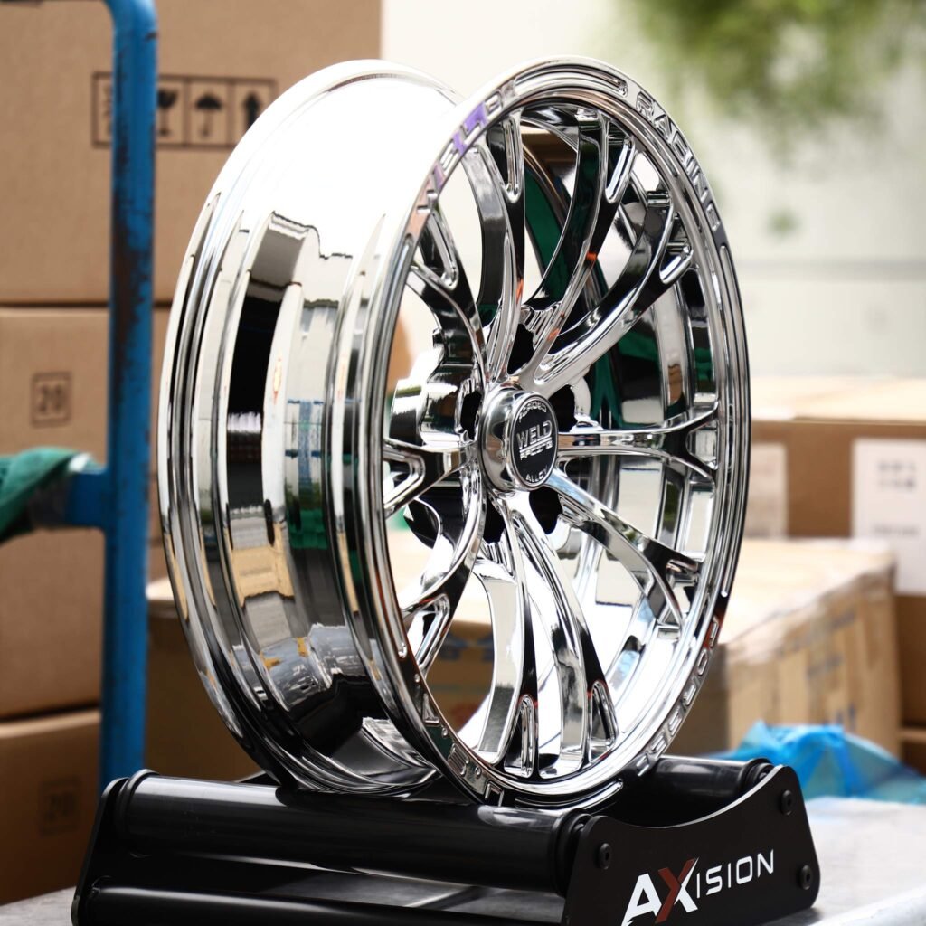 5x115 wheels – Chrome 10-Spoke Lettered Lip (Weld Racing-Style), side view