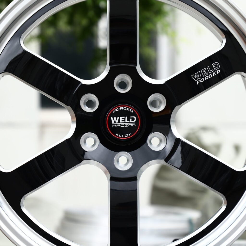 6x135 wheels – Gloss Black 5-Spoke Polished Lip (Weld Racing-Style), side view