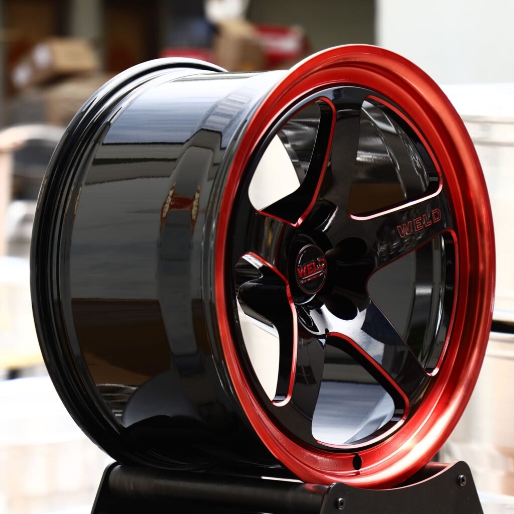 Dodge Challenger wheels – Gloss Black 5-Spoke Red Deep Lip (Weld Racing-Style), angled view
