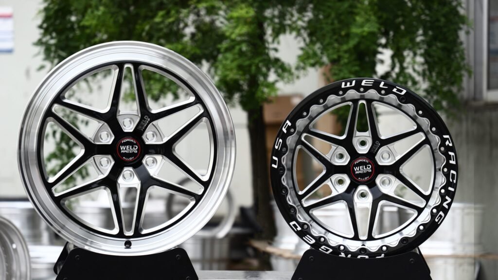 GMC Sierra 1500 wheels – Gloss Black Milled Split-Spoke Star Polished Lip (Weld Racing-Style), close-up view
