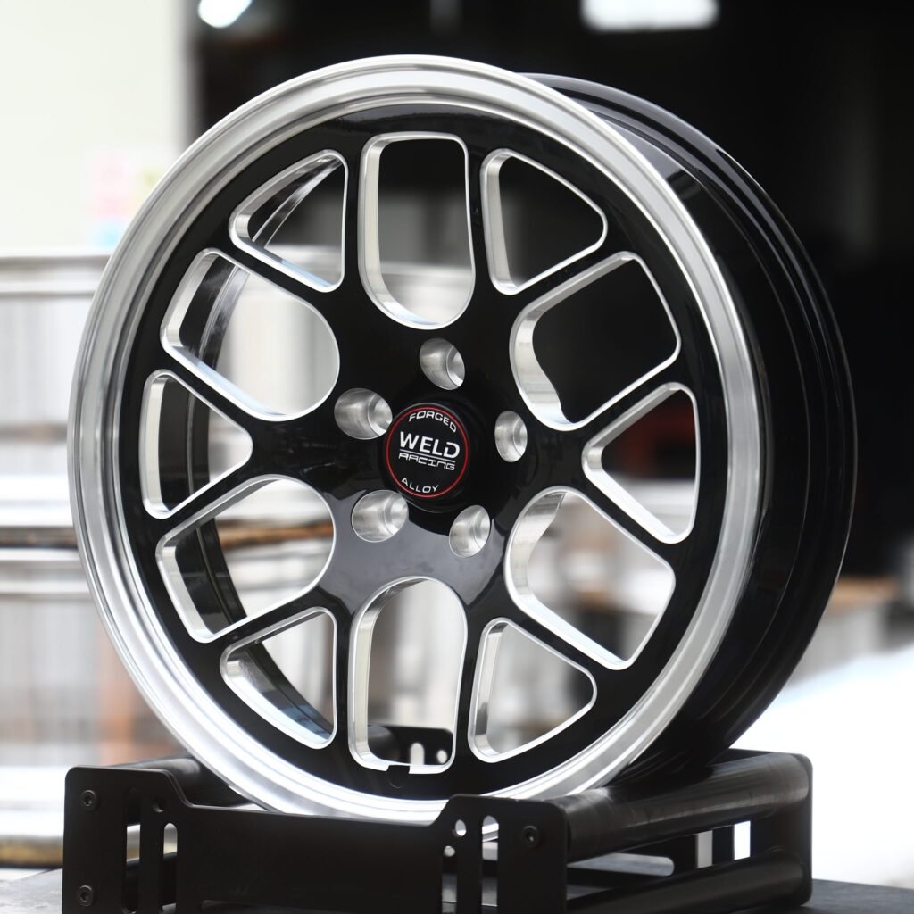 Chevrolet Camaro wheels – Gloss Black Milled Y-Mesh Polished Lip (Weld Racing-Style), angled view