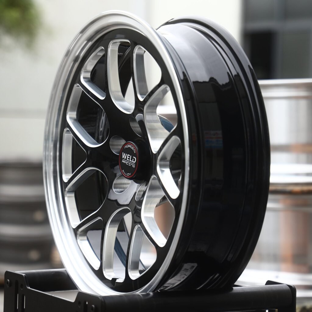 5x115 wheels – Gloss Black Milled Y-Mesh Polished Lip (Weld Racing-Style), side view