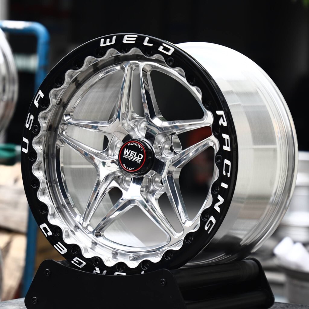 Chevrolet Corvette wheels – Polished 5-Star Black Ring Beadlock (Weld Racing-Style), angled view