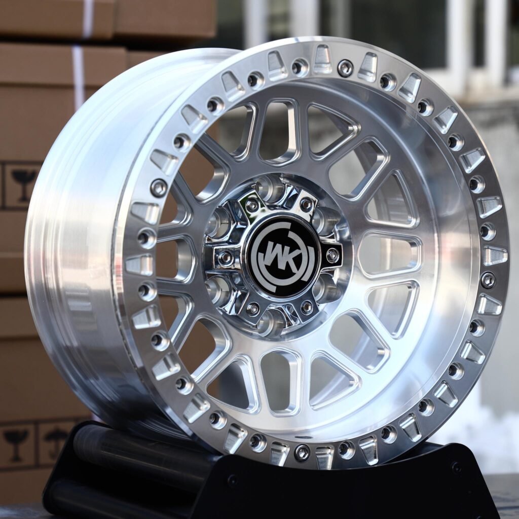 Ram 2500 wheels – Machined Silver Y-Mesh Black Cap Beadlock (WK-Style), angled view