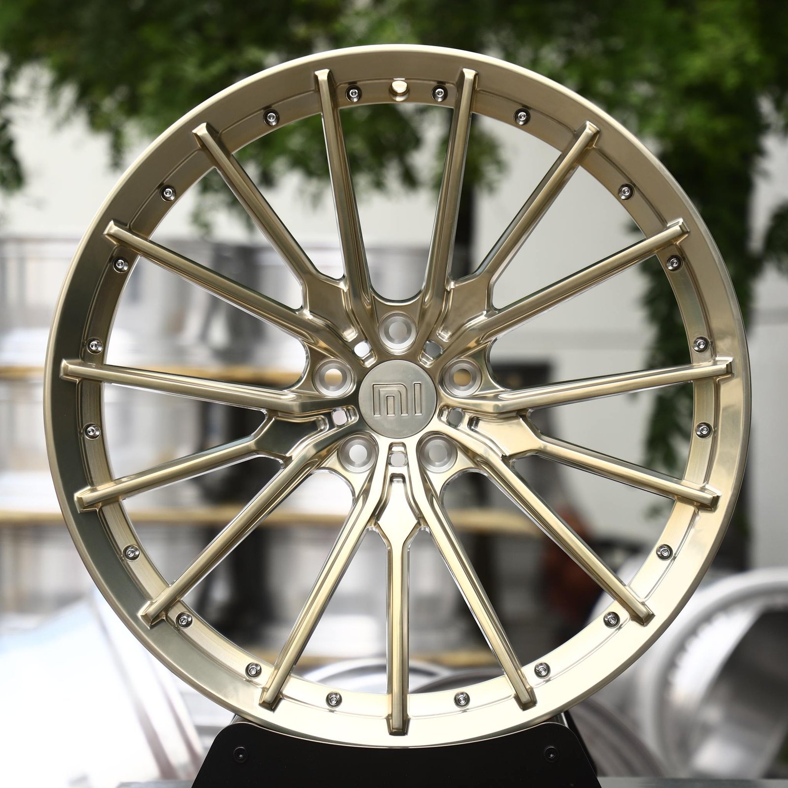 Xiaomi SU7 wheels – Champagne Gold Brushed Multi-Spoke Riveted Lip (Xiaomi OEM-Style), front view