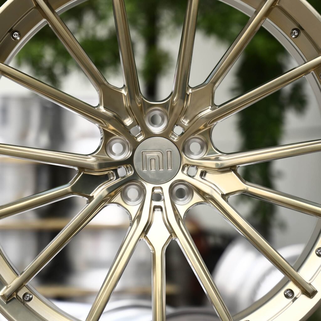 Xiaomi SU7 wheels – Champagne Gold Brushed Multi-Spoke Riveted Lip (Xiaomi OEM-Style), lip and barrel detail