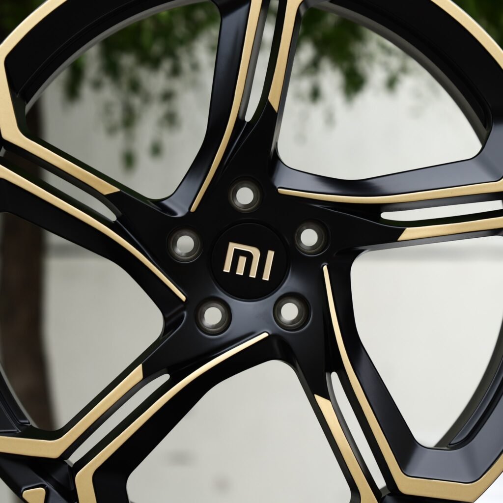 5x114.3 wheels – Satin Black / Gold 5-Spoke Blade (Xiaomi OEM-Style), side view